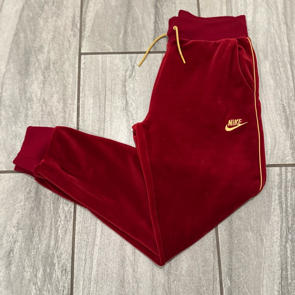 Nike Women's Red Joggers with Gold Trim